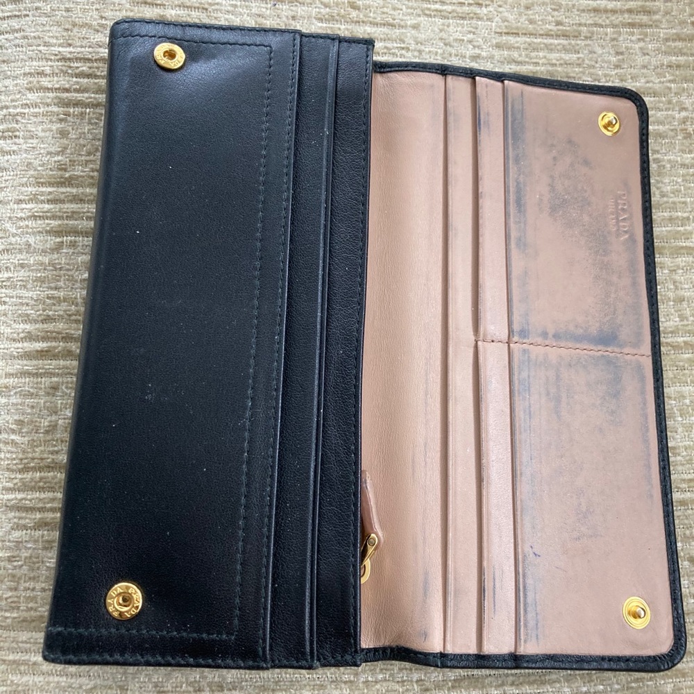 Prada lambskin wallet in black.